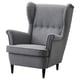 Grey fabric wingback chair, high back, wooden legs, tufted detail.