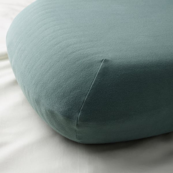 Circular cushion, soft fabric.