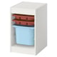 Ikea TROFAST unit, white, with blue bin, red trays. Storage for kids items, organized.
