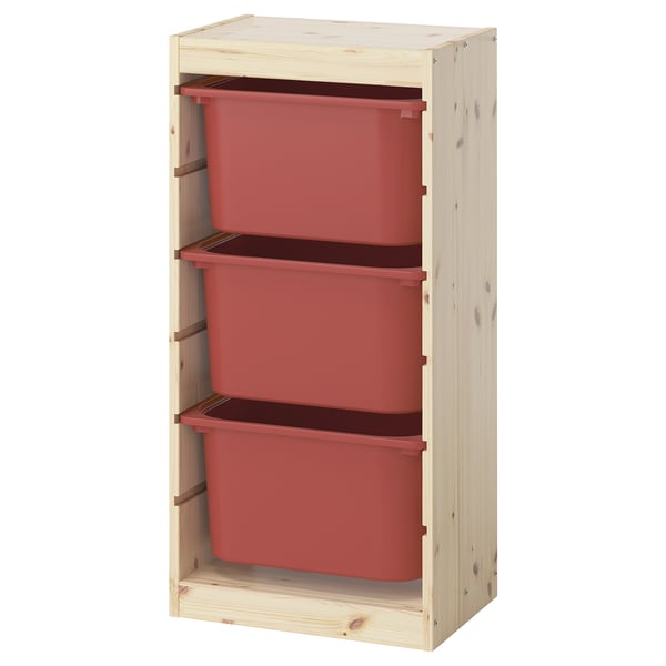 An ikea TROFAST wooden storage unit with three red plastic bins.