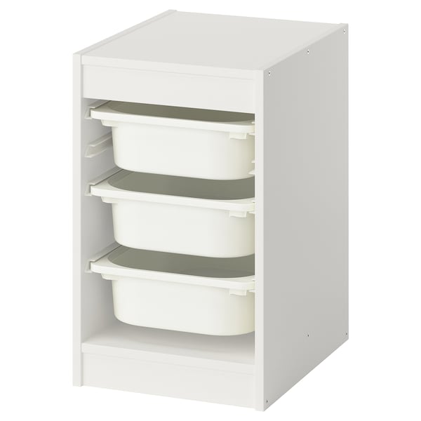 White TROFAST storage unit with four green-lined bins, stackable, wooden frame, plastic boxes, rectangular shape.