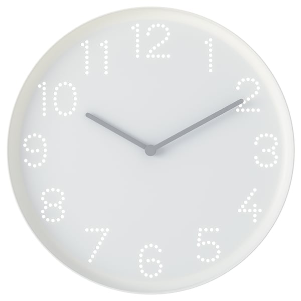 Round white wall clock with numbered holes, two hands, simple design.