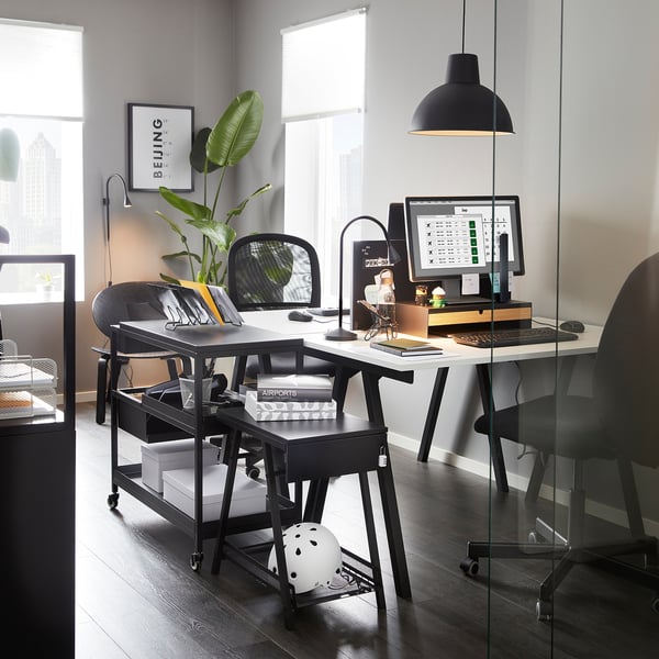 Modern desk storage with lockable drawer and helmet shelf.