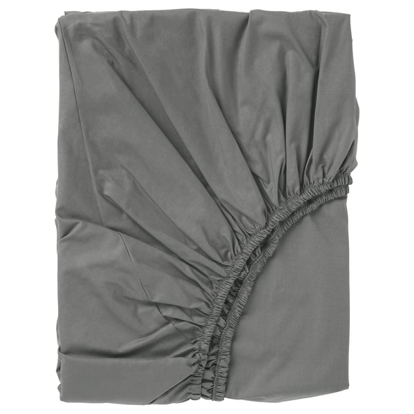 Grey ULLVIDE bed sheet, rectangular with elastic ruffled edges.