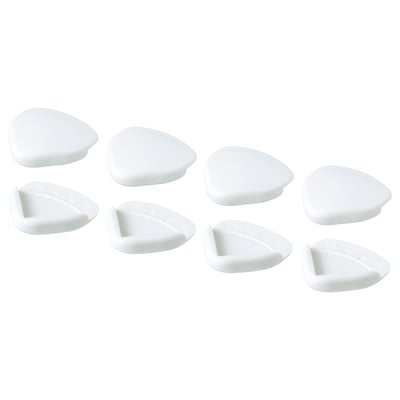 Eight white teardrop-shaped foam corner protectors arranged in two rows.