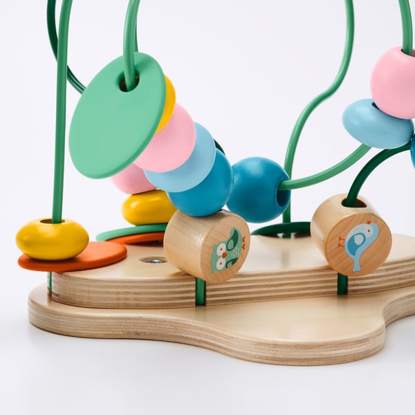 Colourful wooden toy with beads and figures, showcasing high-quality craftsmanship and vibrant, child-friendly design.