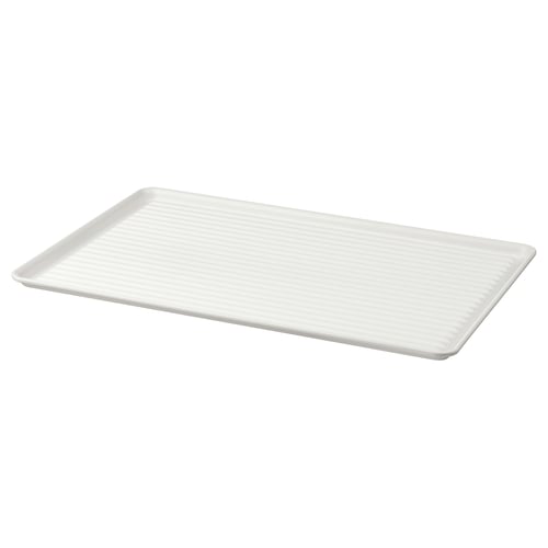 White VÄLVÅRDAD dish drainer with raised edges, made of galvanised steel. Efficient for drying dishes.