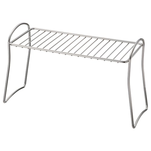 Stainless steel kitchen drying rack with curved legs.