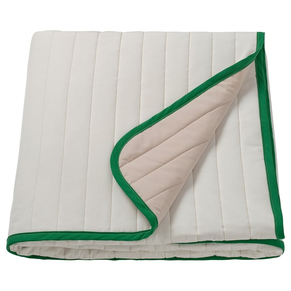 VETEJORDFLY bedspread, white/beige with green edge, rectangular, smooth design.
