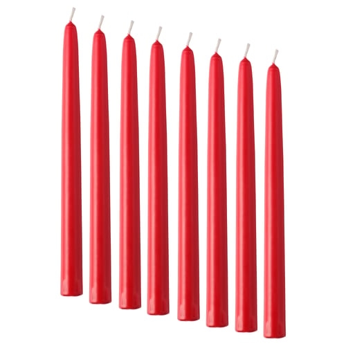 Eight red, cylindrical candles lined up, each with a white wick tip. Sleek and simple design.