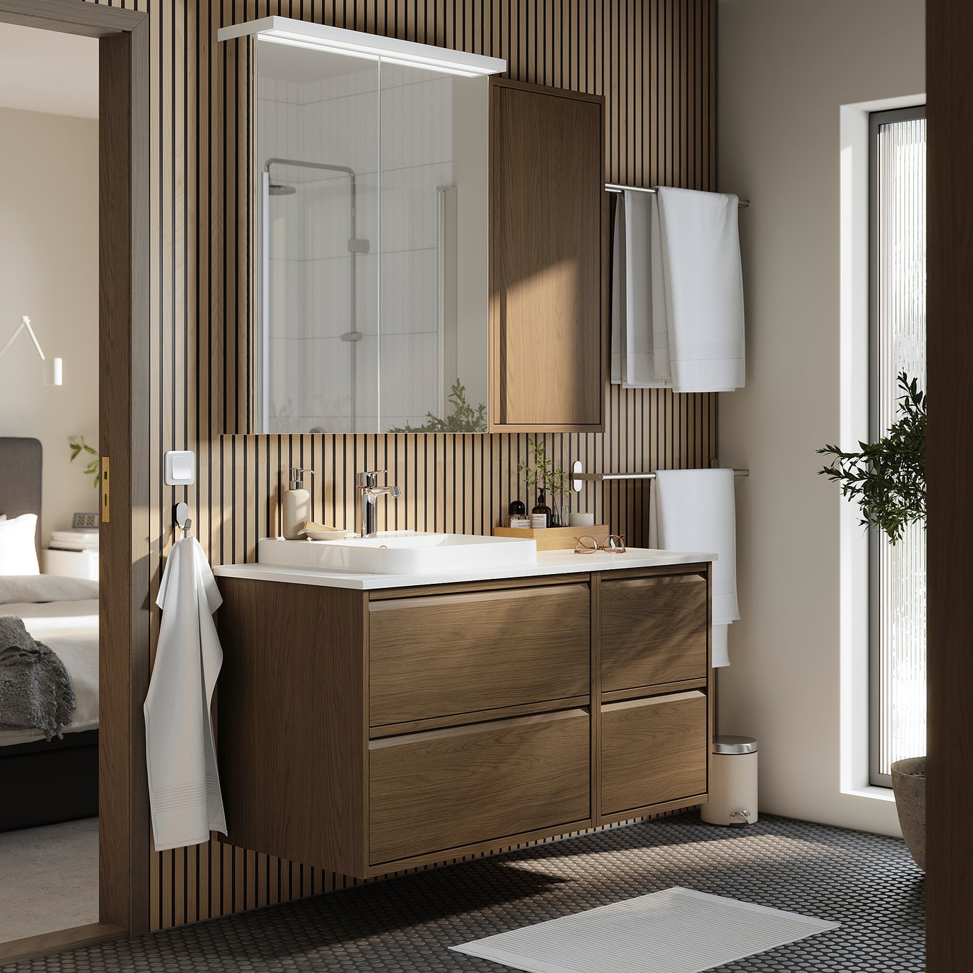 Modern ÄNGSJÖN vanity in dark oak, minimalist design, wall-mounted.