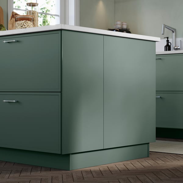 Modern kitchen with green ASPUDDEN cabinet. Smooth design, foil finish, dark grey-green. Small, sleek covers at low height.