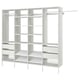 White AURDAL storage system with adjustable shelves and hanging rails, ideal for organising small spaces.