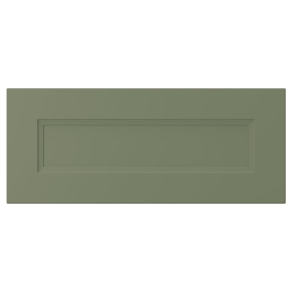 A green, rectangular kitchen cabinet door with an inset panel design. It is styled in a traditional manner with a smooth surface.