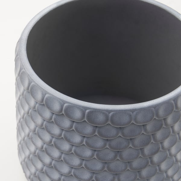 Grey vase with scale design, smooth interior, modern style.