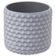 Round, grey concrete planter with textured scale design, flat bottom.
