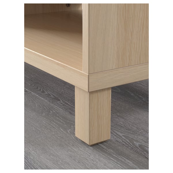 A wooden shelf units corner shows clean lines and sturdy construction.