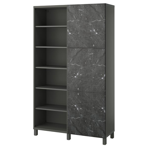 Modern black BESTÅ bookshelf marble-pattern doors, open shelves, and metal legs.