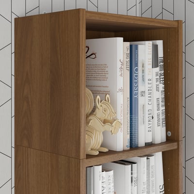 Wooden bookshelf with books and a wooden toy, optimising vertical space for storage.
