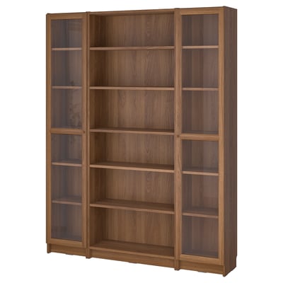 Large BILLY bookcase, light brown, wooden finish, rectangular shape, with multiple shelves and two glass doors.