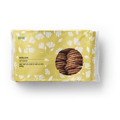 Ikea BJÄLLRA oat cookies pack, featuring floral design, window view of cookies, net weight 21. 2 oz.