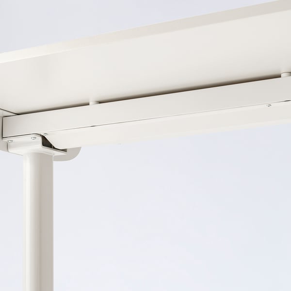 Bright, modern desk with durable, stain-resistant top; adjustable, rounded legs; minimal noise operation.