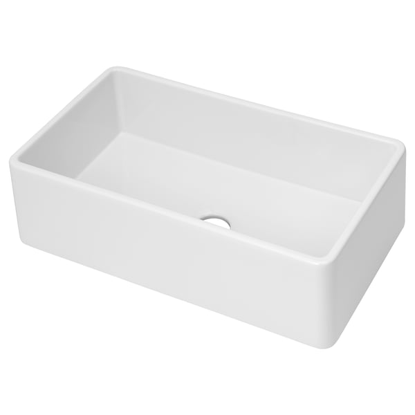 A white BOVIGGEN ceramic farmhouse sink with an apron front, designed for large items and easy cleaning.