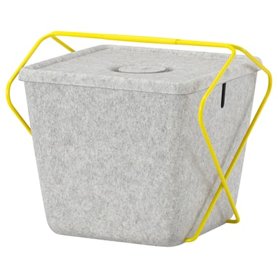 A grey felt BRÄNNBOLL basket with yellow handles, sitting on a stand.