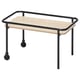 A BRÄNNBOLL side table with black metal frame and wooden top. It has wheels for mobility and a high edge to keep items from sliding off.