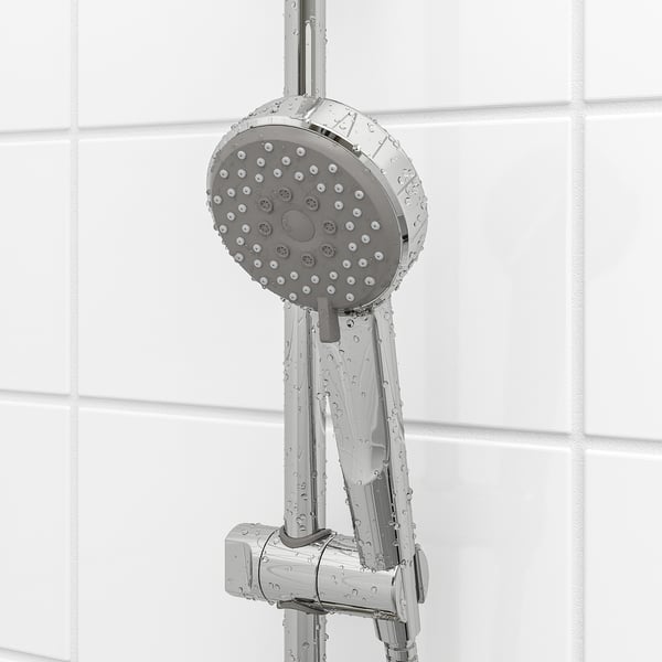 Chrome hand shower with multiple spray options and flexible bracket.