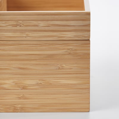 Close-up of natural bamboo storage box with smooth, even grain texture.