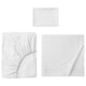 Displays a white DVALA bed linen set, consisting of a flat sheet, a fitted sheet, and a pillowcase, all made of 100% natural cotton.