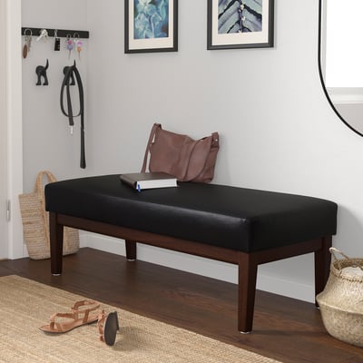 Black retro EKENÄSET bench fits various rooms.