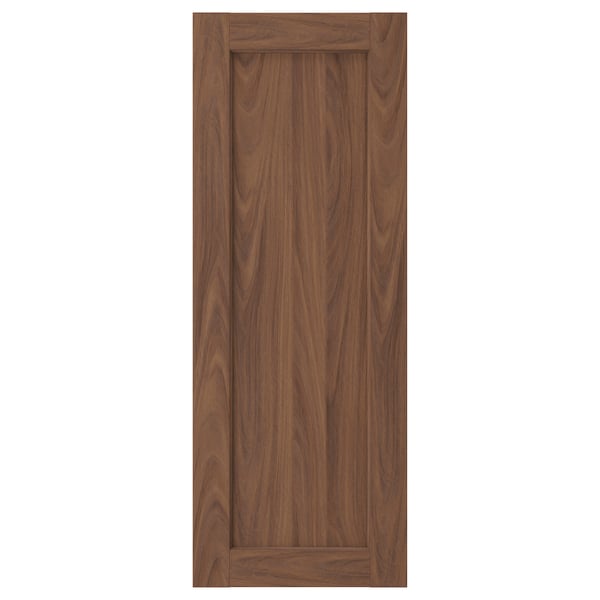 A brown walnut cabinet door with a smooth finish and subtle wood grain texture. The door has a rectangular frame and panel design.
