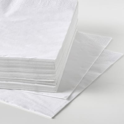 Stack of pure white, neatly folded paper napkins; soft texture, ready for use.