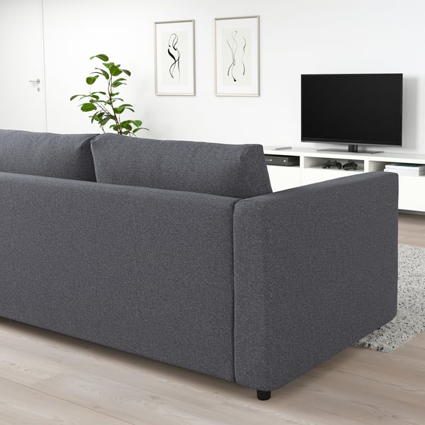 Modern grey FINNALA sectional sofa, clean design, comfortable, fits well in large living rooms.