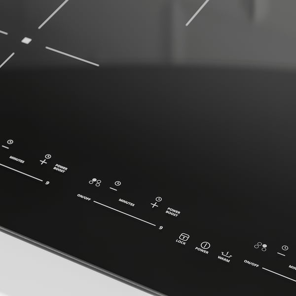 Black induction hob with touch controls, multiple heat settings, and a sleek glass surface.
