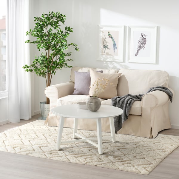 Iflyväg handwoven rug in beige, wool & cotton, fits under sofa, cosy textured diamond pattern.