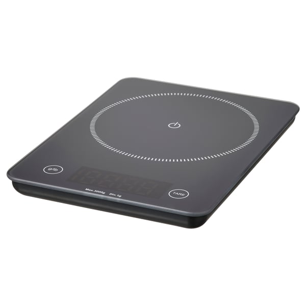 GENOMSNITT digital kitchen scale, black, glass top, rectangular, digital display.
