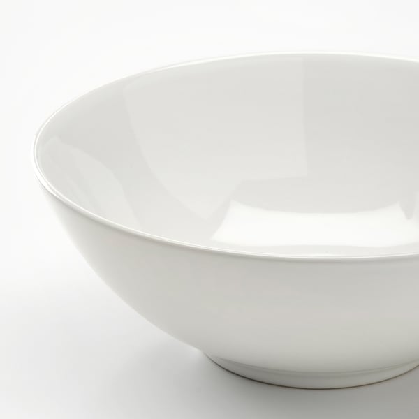 Elegant white bowl, smooth edges, refined surface.