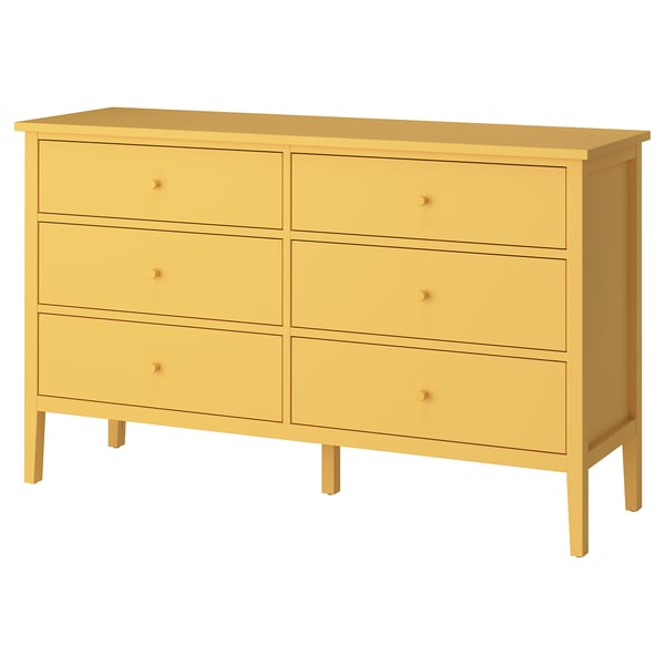 A yellow GULLABERG six-drawer chest. Made from particleboard and acrylic paint, it a rectangular shape with tapered legs and simple, clean lines.