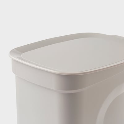 Modern rubbish can with smooth, rounded lid and durable plastic for easy cleaning.