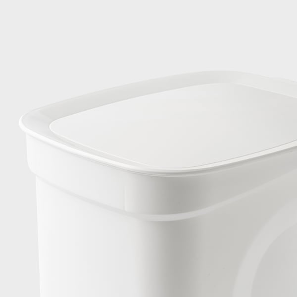 Close-up of a modern, white kitchen pedal bin with sleek design and smooth surfaces.