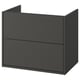 This image depicts a dark grey, wall-mounted bathroom cabinet with two drawers. It a sleek, modern design with no visible handles and a smooth finish.