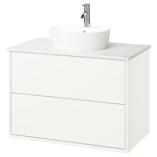 Modern white bathroom vanity with round basin & chrome tap.