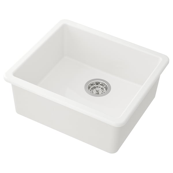 A white HAVSEN kitchen sink with a drain. It is rectangular, made of ceramics, and has a smooth, rounded design.