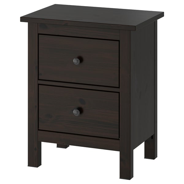 Dark brown wooden bedside table with two drawers and round knobs.