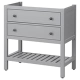 Grey HEMNES 3-drawer dresser with open shelf.