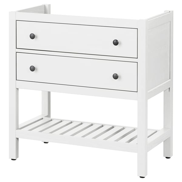 A white HEMNES dresser, featuring two drawers with black knobs and an open shelf, crafted from pine wood.