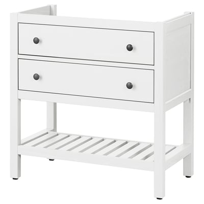 A white HEMNES dresser, featuring two drawers with black knobs and an open shelf, crafted from pine wood.